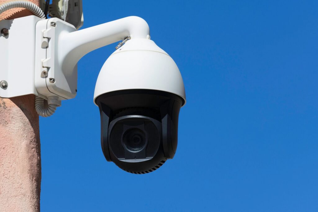 PTZ security camera on a building outdoors